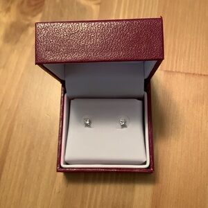 Helzberg Diamond stud earrings in original box and case. NEVER WORN!